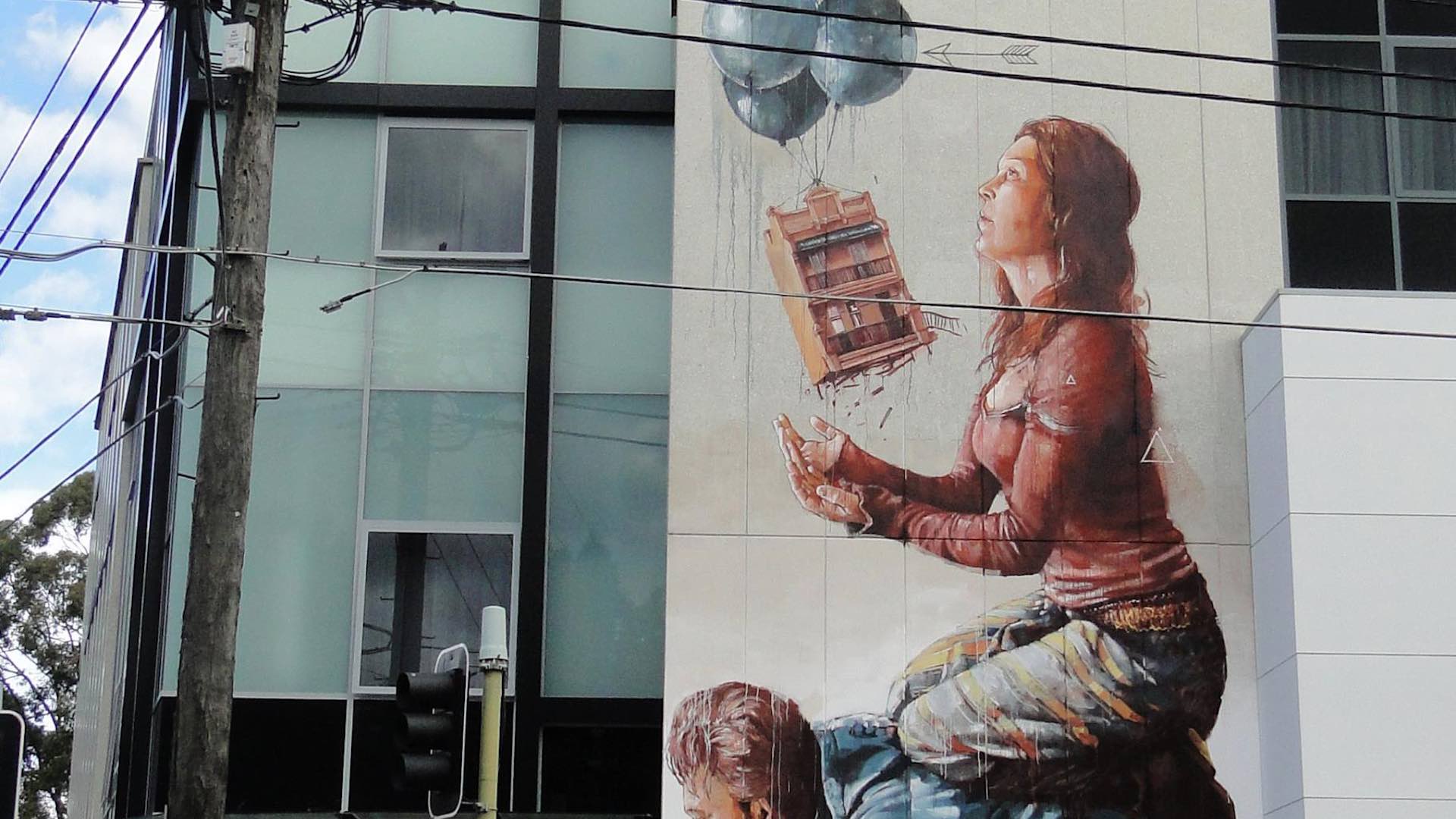 Housing Bubble mural by Fintan Magee