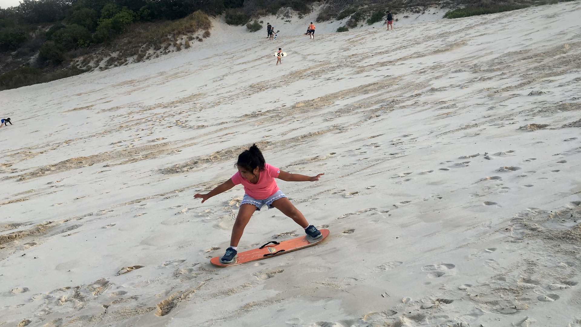 Sandboarding with Straddie Adventures in Queensland
